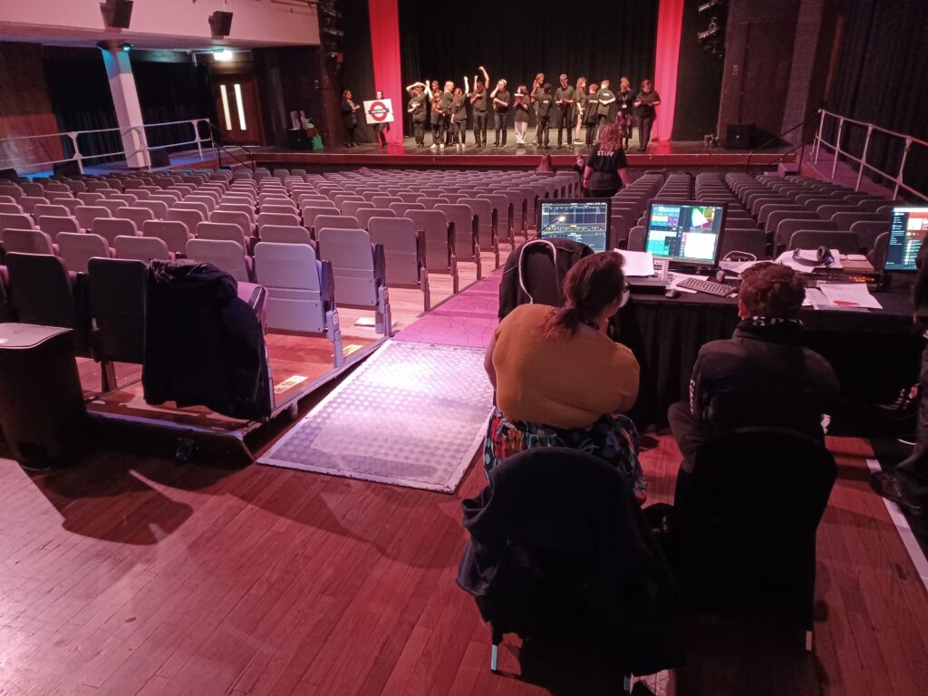 A wide shot showing students rehearsing their performance of Romeo & Juliet at the 2023 Coram Shakespeare Schools Festival.